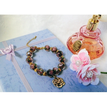 Burgundy rose glass bead bracelet with gold rose charm